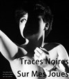 Traces noires sur mes joues - 