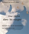 Une Vache dans les nuages - 